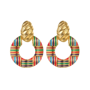 Ethnic style woven hollow round gold earrings with colorful enamel stripes on white background