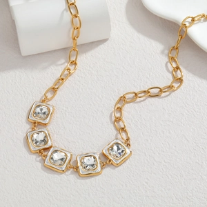 French vintage style gold link necklace with square white enamel and crystal charms