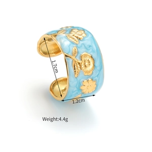 Detail view of blue enamel ring showing size 1.7cm by 1.2cm and gold floral relief