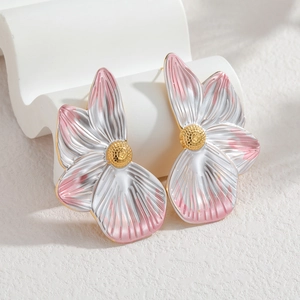 Pink and white gradient petal flower earrings with silver accents and golden center