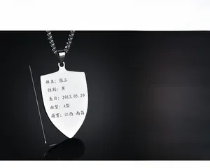 Detailed view of customizable stainless steel dog tag necklace with personalized engraving
