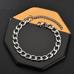 Minimalist stainless steel NK flat link chain bracelet with lobster clasp on display