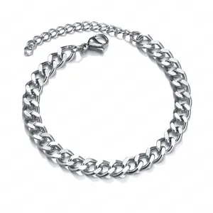 Detail of silver Cuban link bracelet with lobster clasp and adjustable extension chain