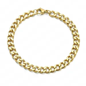 Close-up of golden stainless steel Cuban link bracelet with lobster clasp closure