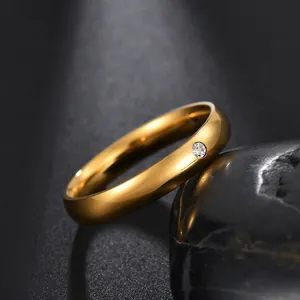 Polished 4mm gold-plated stainless steel ring with a single round-cut zircon stone