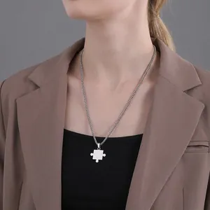 Polished stainless steel jigsaw puzzle pendant necklace for couples on a long chain