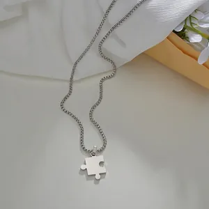 Polished silver stainless steel puzzle piece necklace with sturdy box chain for couples