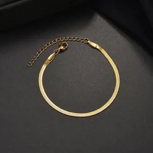 Detail of 18k gold plated herringbone snake chain bracelet with lobster clasp and extender