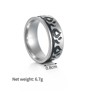Detail view of flame pattern ring showing 0.8cm width and 6.7g weight on white background
