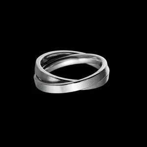 Minimalist silver interlocking triple band ring for men made of polished stainless steel