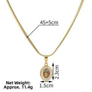 Detail view of gold 18k plated stainless steel Virgin Mary pendant with white rhinestones
