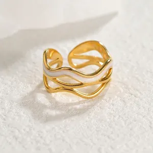 Vintage 18k gold plated stainless steel wave ring with white enamel accents
