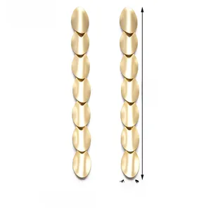 Detail view of oval tassel earrings in gold finish showing dimensions 7.5cm length