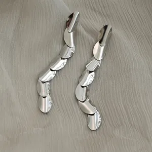 Polished silver stainless steel oval tassel drop earrings with a minimalist geometric design