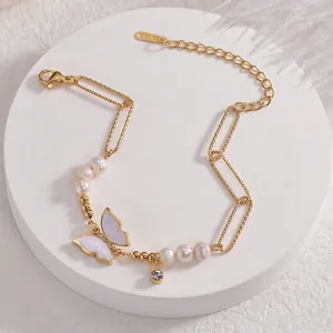 Elegant gold titanium steel bracelet with white pearls and iridescent butterfly charm