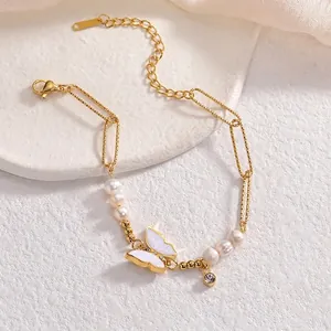 Elegant gold titanium steel bracelet with butterfly pendant and natural pearls