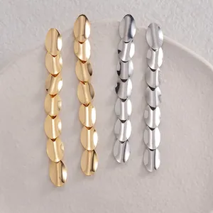 Oval tassel tiered drop earrings in polished gold and silver stainless steel finish