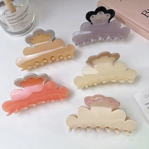 Five pieces of cloud-shaped acetic acid hair claws in assorted soft colors with glossy finish