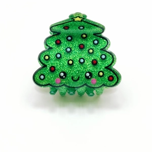 Pinza para el pelo de árbol de Navidad verde brillante con cara linda y puntos