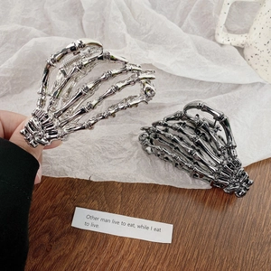 Skeleton hand hair claws in silver and gun black alloy finish for Halloween styling