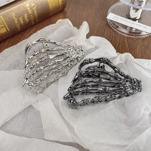 Gothic skull hand hair claw clips in silver and gunmetal finish for Halloween