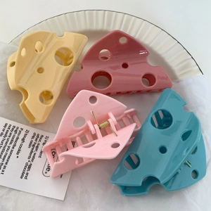 Set of four colorful creative cheese-shaped hair claws with unique hollow triangular design