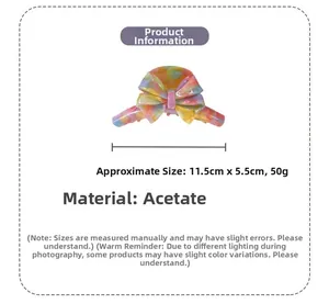 Détail de la pince à cheveux papillon en acétate dimensions 11,5 cm par 5,5 cm