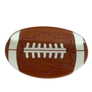 Polished rugby-shaped hair claw clip in classic brown and white for elegant hair styling
