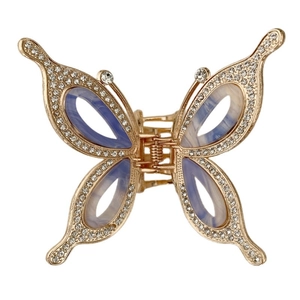 Elegant gold butterfly hair claw clip with blue marble resin wings and sparkling rhinestones