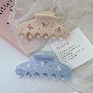 Elegant rhinestone butterfly hair claw clips in morandi cream and pastel blue tones