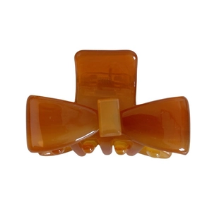 Minimalist tortoiseshell acetate bow hair claw clip in amber brown for women hair styling