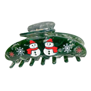 Pince à cheveux marbre vert foncé avec motifs de bonshommes de neige et flocons
