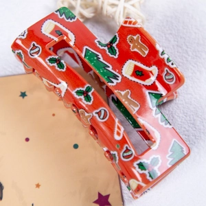 Pince à cheveux de Noël rouge avec motifs de bonhomme en pain d'épice et sapins festifs