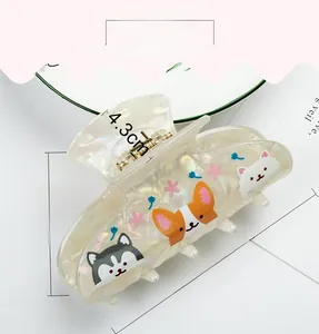 Detailed size view of an 8.3cm acetate animal print hair claw clip with cat patterns