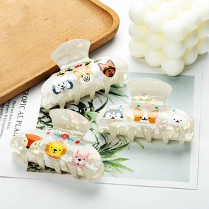 Iridescent animal print hair claw clips set featuring cute cartoon dog and fox patterns