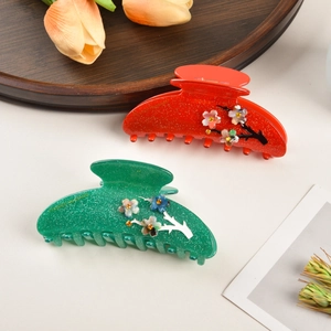 Pinces à cheveux élégantes en acétate avec strass brillants en rouge et vert