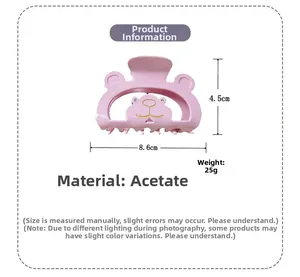Dimensions de la pince à cheveux ours rose avec 8,6 cm de long et 4,5 cm de haut en acétate