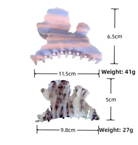Confronto dimensioni tra mollette per capelli a forma di barboncino in acetato colorato