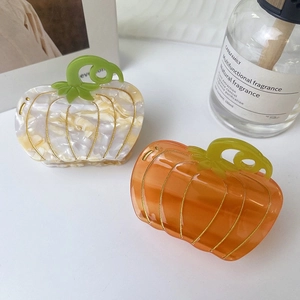 Elegant pumpkin hair clips in cream marble and translucent orange acetate for women
