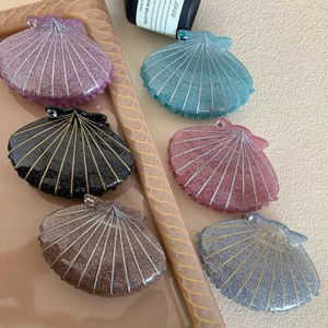 Pinces à cheveux élégantes en forme de coquillage avec paillettes et strass brillants