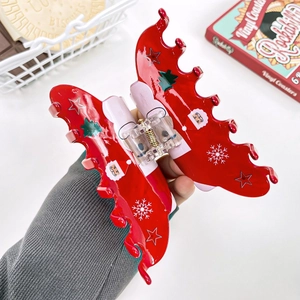 Red Christmas hair claw clip with festive patterns of Santa and snowflakes for women