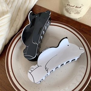 Cute polar bear acetate hair claws in black and white finish for versatile styling
