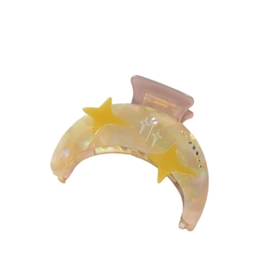 Starry moon acetate hair claw clip with yellow marble pattern and pearl rhinestones