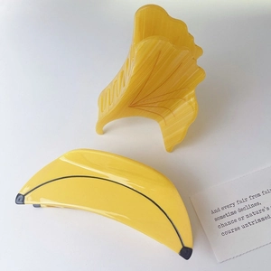 Creative yellow ginkgo leaf and banana hair claw clips set in glossy acetate finish