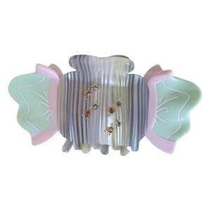 Elegante pinza per capelli a farfalla con strass e motivi a righe verticali in acetato