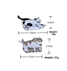 Spécifications de taille et poids pour pinces à cheveux chat en motifs noir, blanc et calicot