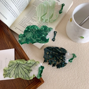 Fashionable green acetate lotus leaf hair claws with marble texture and white rhinestones