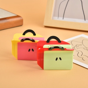 Chic acetate hair claw clips in colorful mini handbag shapes with sleek black handles