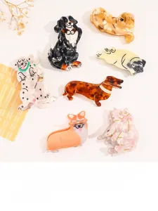 Detailed flat lay of cute animal-shaped acetate hair claws including corgi and pug designs
