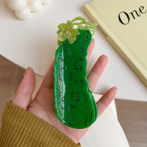 Creative cucumber shaped hair claw clip in green acetate with realistic textured details